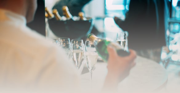 Bartender serving champagne at corporate event