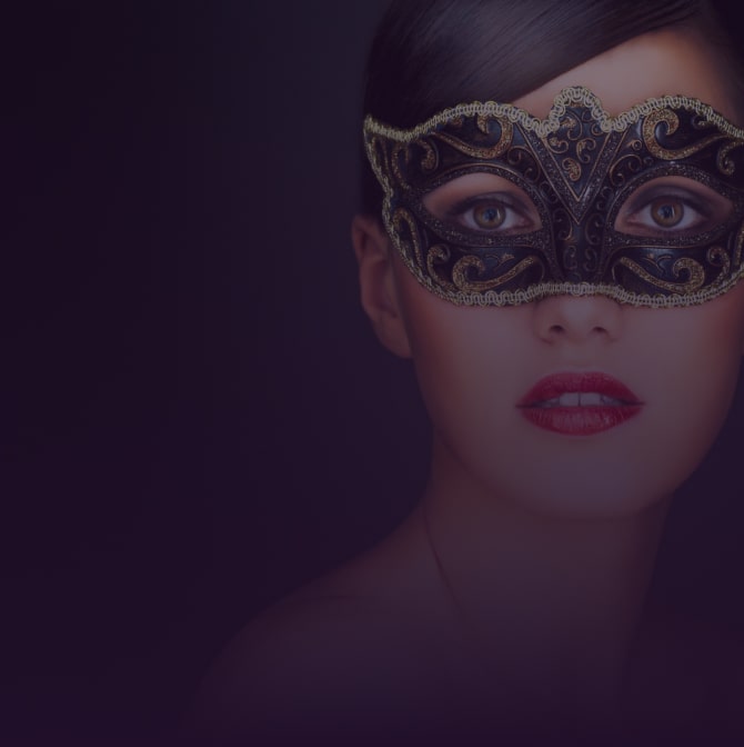 Woman wearing masquerade mask to a corporate party